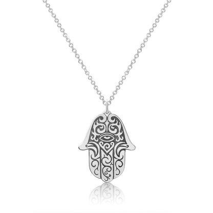 Tattoo inspired hamsa necklace in sterling silver with hand-engraved details by Alef Bet