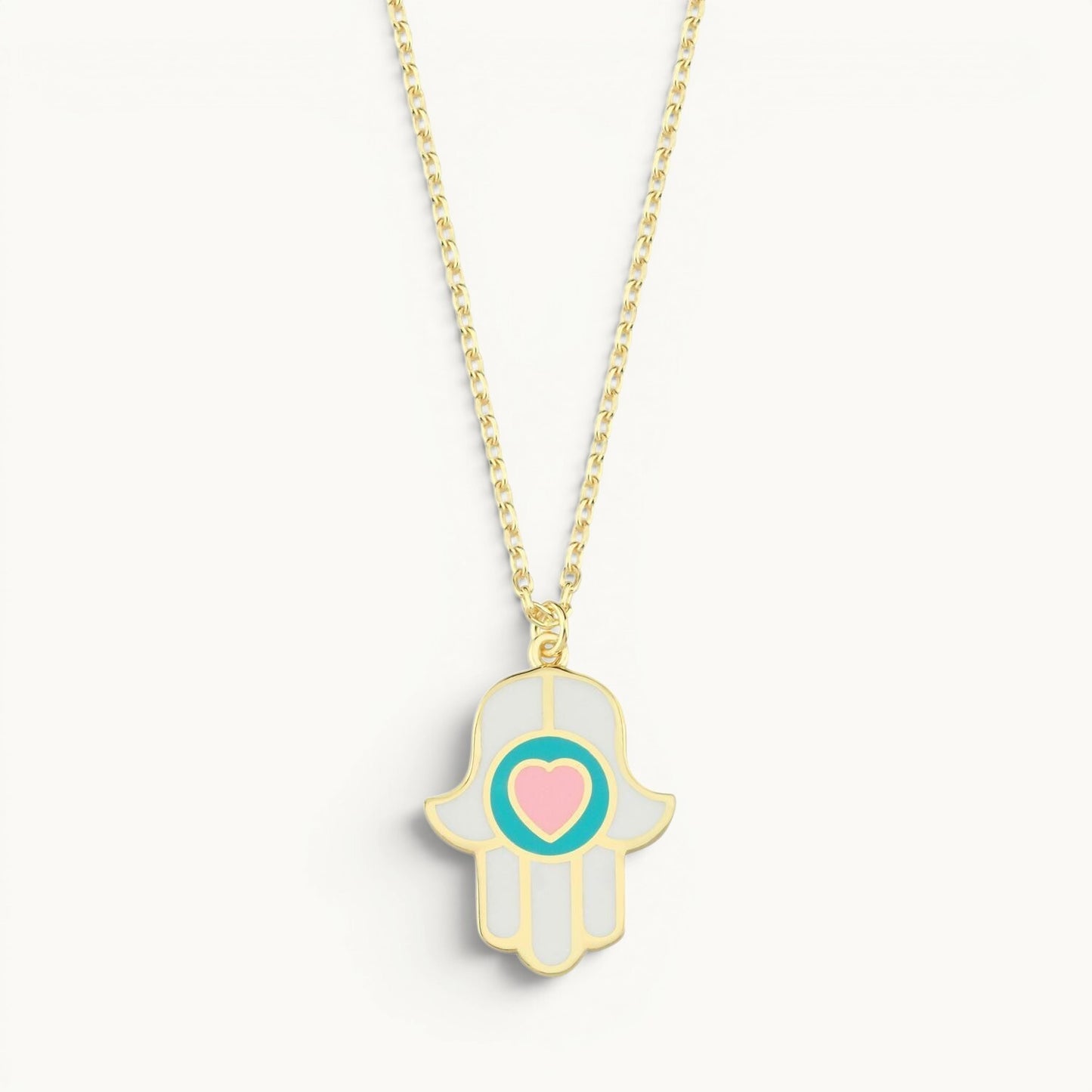 Heart hamsa necklace in white and pink enamel gold with dual protective symbols by Alef Bet