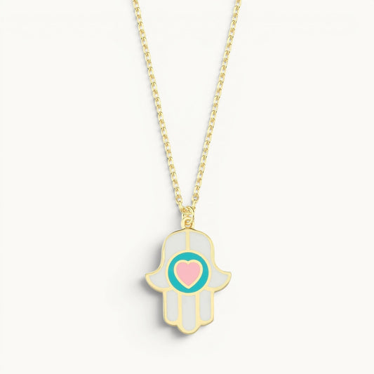 Heart hamsa necklace in white and pink enamel gold with dual protective symbols by Alef Bet