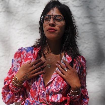 Intricate Gemstone Hamsa Pendant in Gold