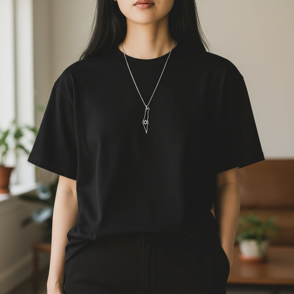 black t-shirt and map of israel jewelry 