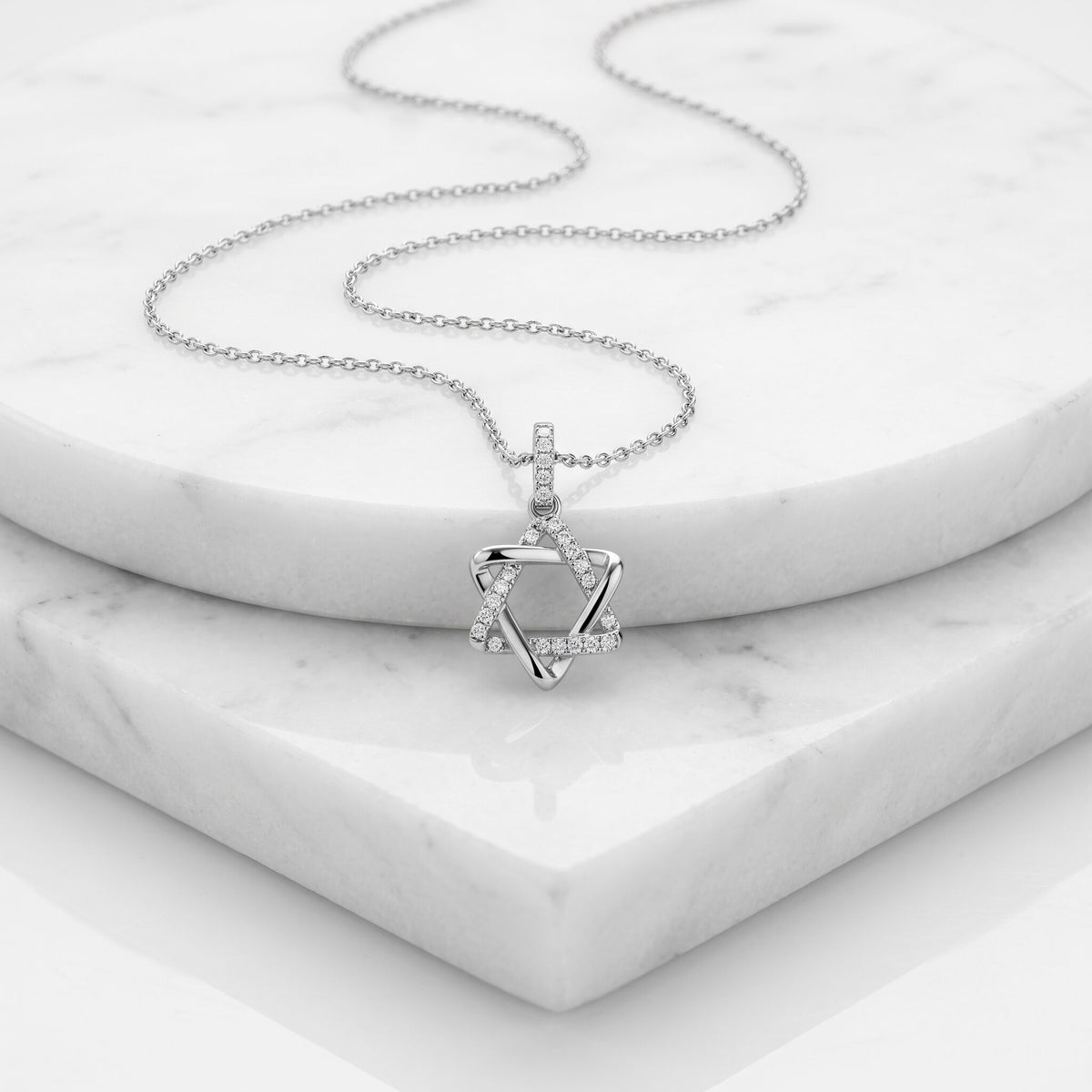 Pave diamond Jewish star necklace in 14k white gold with pavé-set stones by Alef Bet