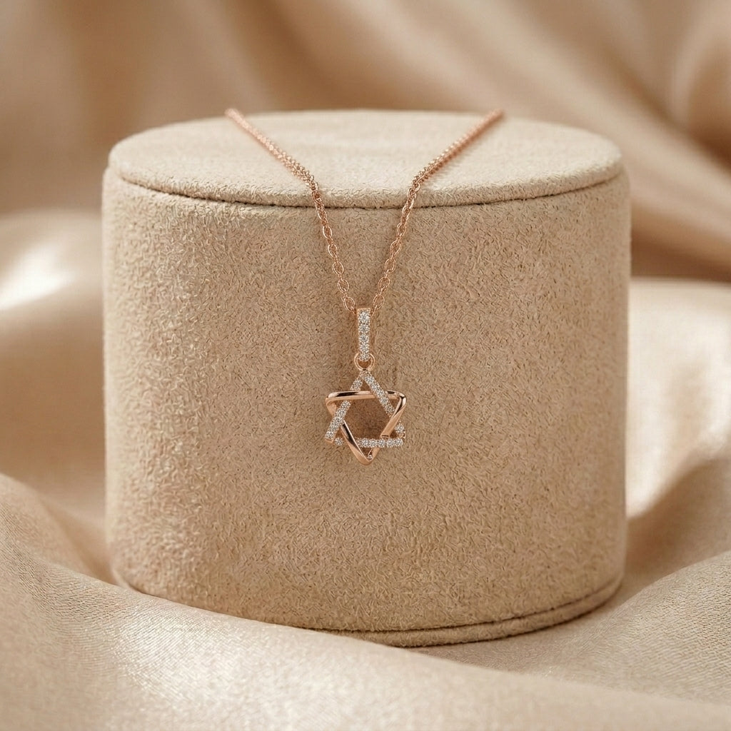 Pave diamond Jewish star necklace in 14k rose gold with brilliant-cut diamonds by Alef Bet