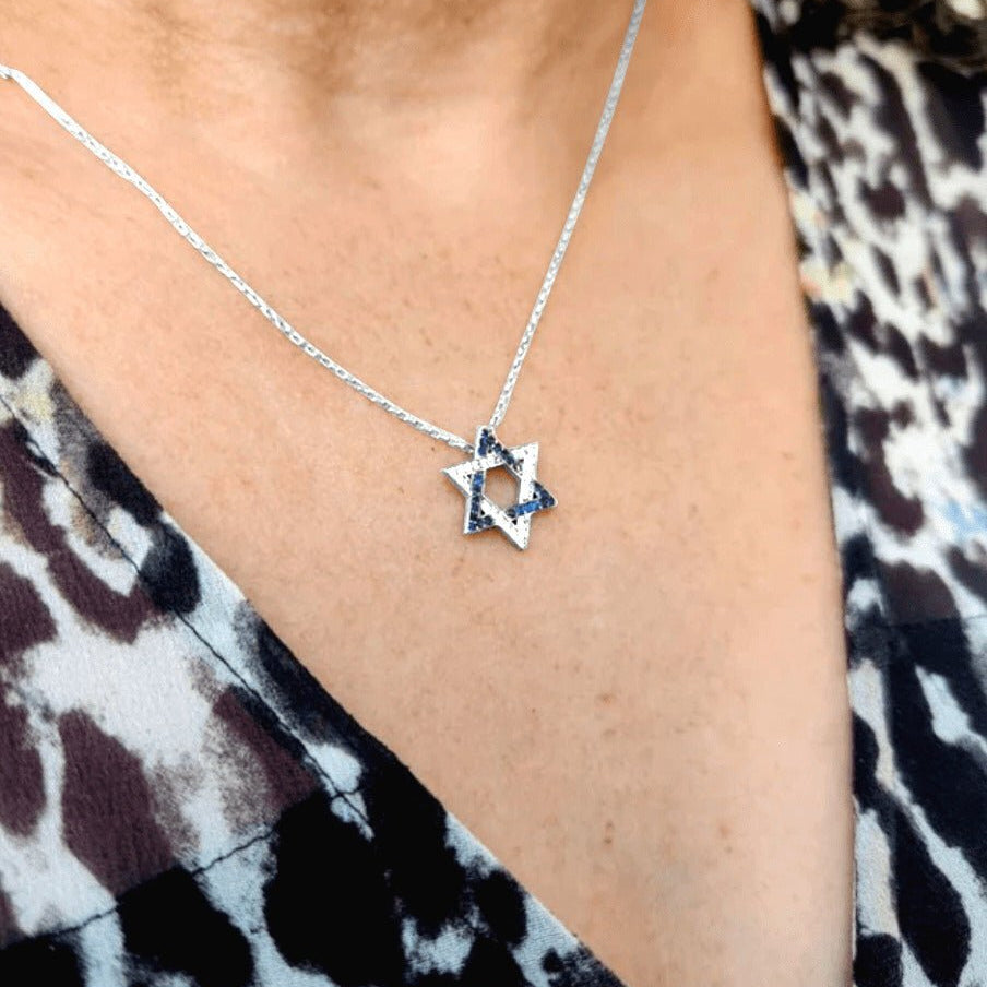 Gold-plated pendant necklace featuring the Star of David, adorned with blue and white cubic zirconia, symbolizing Israel.