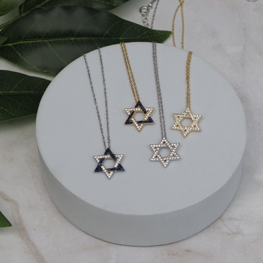 Israel Flag Jewish Star necklace featuring a gold-plated silver pendant with blue and white cubic zirconia, symbolizing pride and identity.