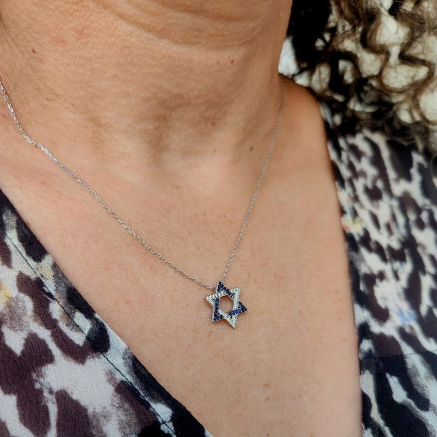 Gold-plated Israel Flag Jewish Star necklace with cubic zirconia, symbolizing pride and connection to Israel, adjustable chain included.