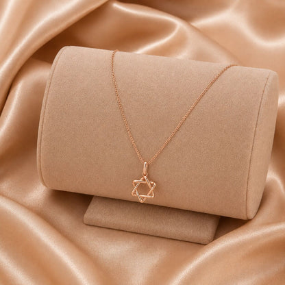 Jewish star necklace in 14k yellow gold with dimensional star centerpiece by Alef Bet