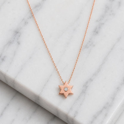 Delicate gold Star of David necklace with diamond center stone by Alef Bet