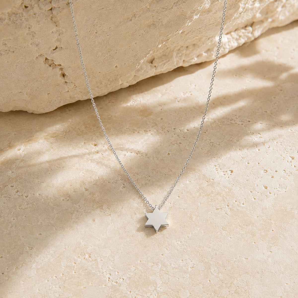 Star of David pendant necklace in gold with minimalist styling by Alef Bet