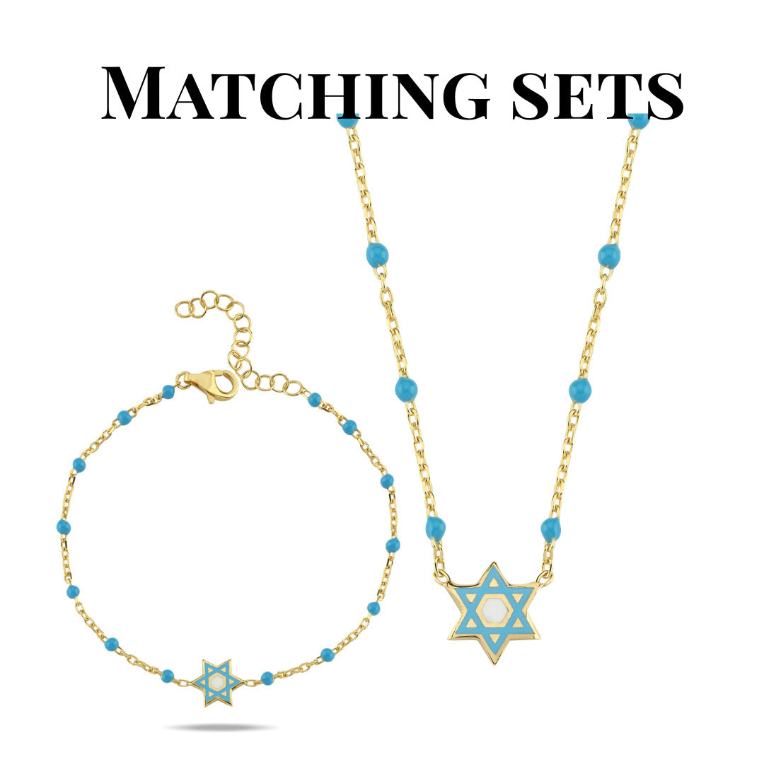 Enamel Jewish star bracelet in yellow gold plating, wrist wear view by Alef Bet