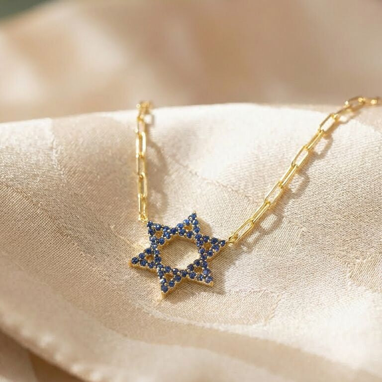 Pave cubic zirconia Jewish Star necklace in yellow gold plated finish by Alef Bet