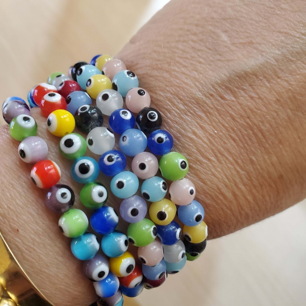 Multicolor Evil Eye Protection Bracelet in Sterling Silver 925, hand strung and joyful enough to wear every single day