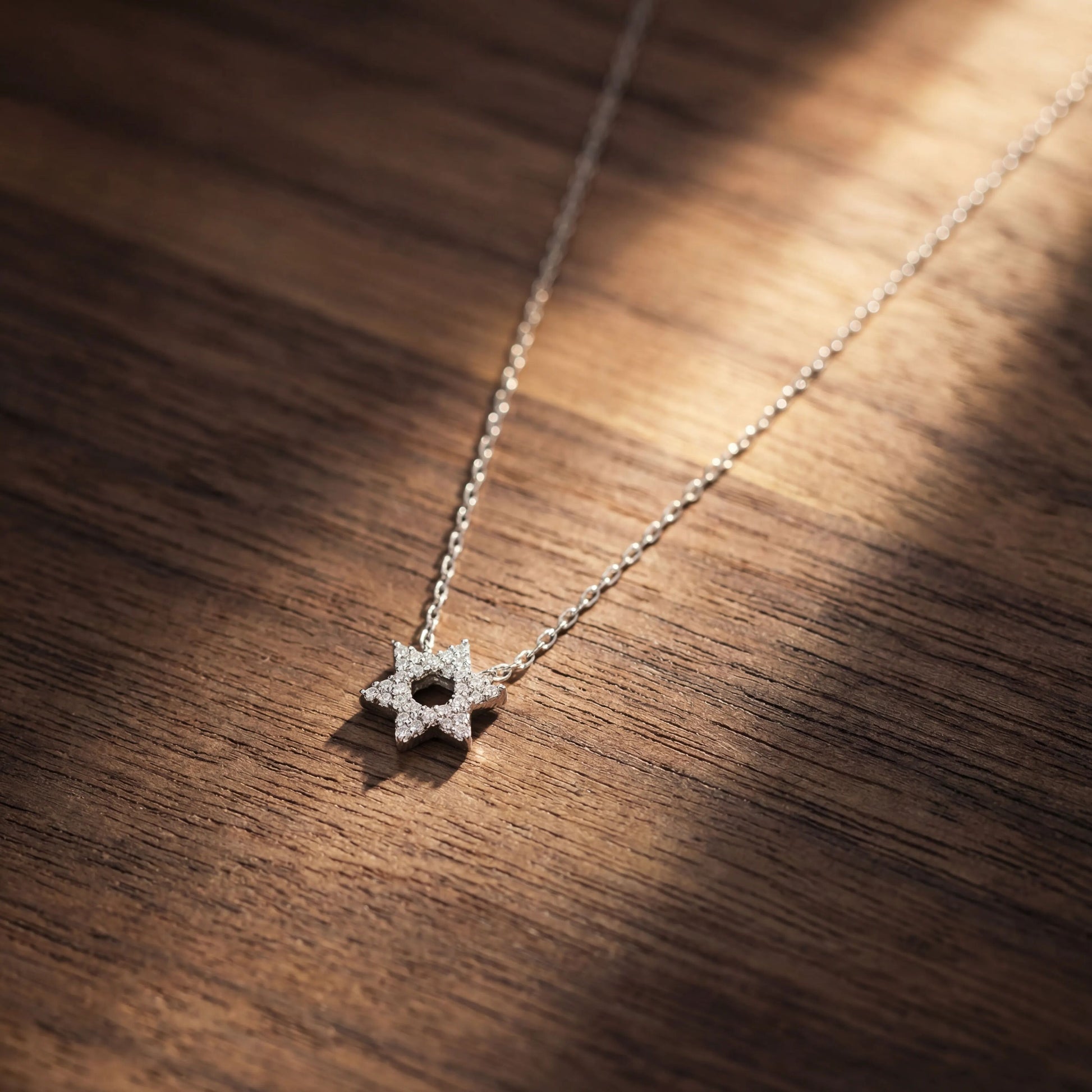 Star of David pendant necklace in sterling silver featuring full pave cubic zirconia setting by Alef Bet