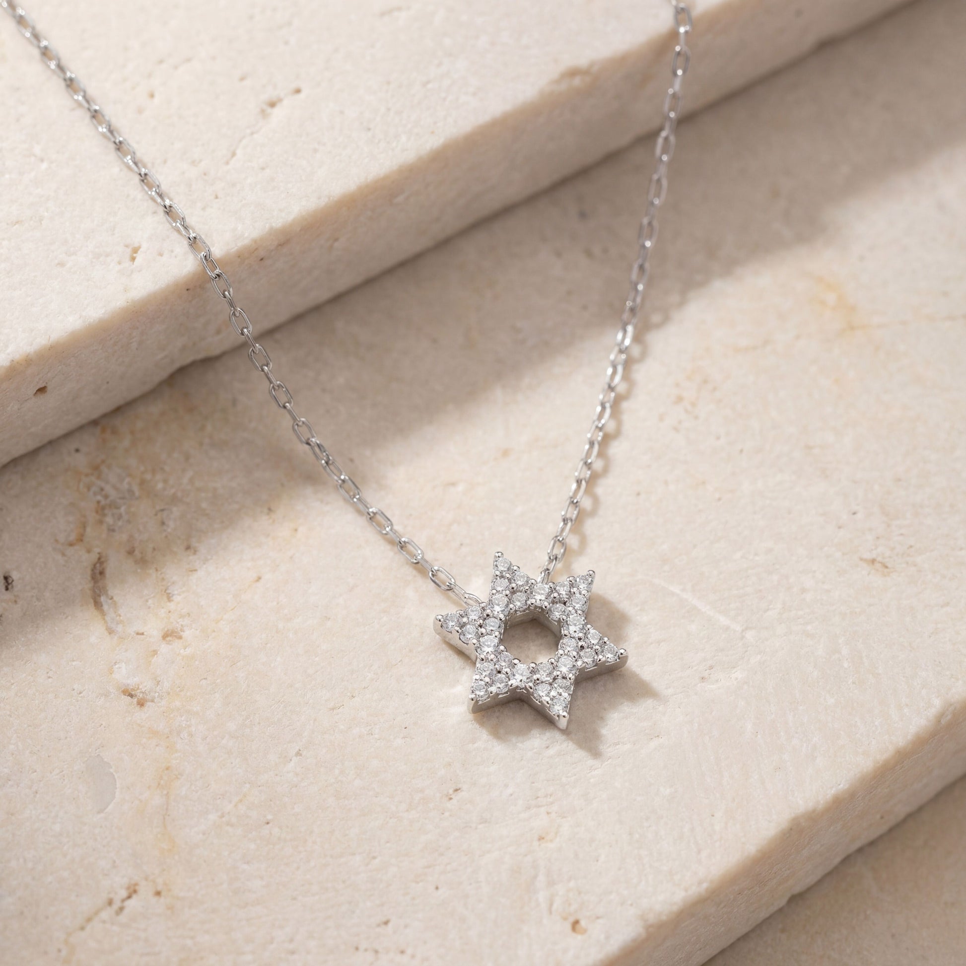 Pave cubic zirconia Star of David necklace in sterling silver, close-up detail by Alef Bet