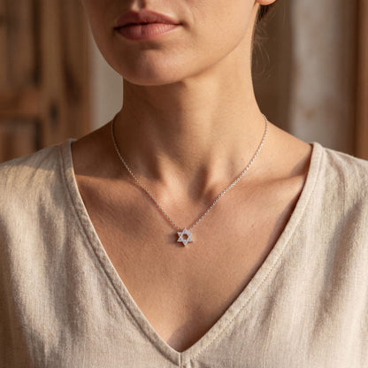 Open Star of David necklace in sterling silver with pave cubic zirconia detail by Alef Bet
