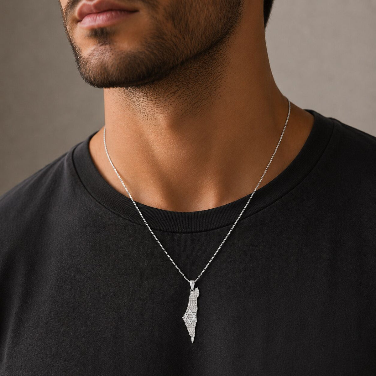 Pave diamond Israel map and Star of David necklace detail showing bezel-set diamonds by Alef Bet