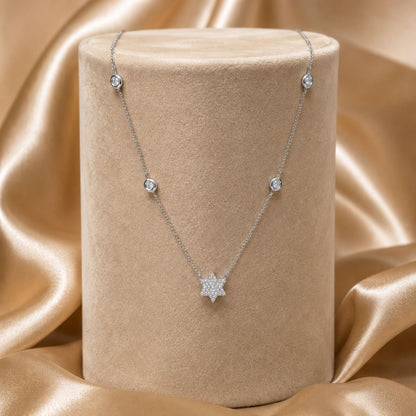 Modern pave diamond star of David necklace in 14k rose gold with delicate chain by Alef Bet