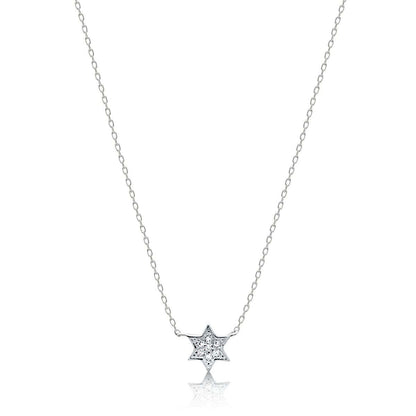 Petite Star of David necklace in white gold with pave diamond accents by Alef Bet