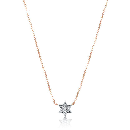 Petite Star of David necklace in 14k gold with pave diamond accents by Alef Bet