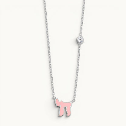 Chai necklace in sterling silver with bezel-set pink cubic zirconia by Alef Bet