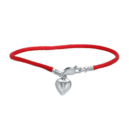 Sterling silver kaballah-inspired red string bracelet, 7” long, symbolizes love and happiness, suitable for all ages.