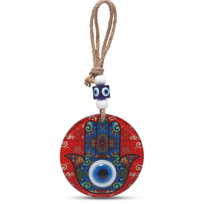 Red glass hamsa hand wall hanging with protective evil eye symbol by Alef Bet