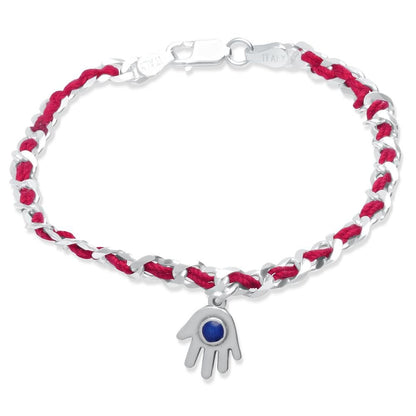 A handcrafted double amulet bracelet featuring a lucky hamsa charm and red string of fate for daily protection and good wishes.