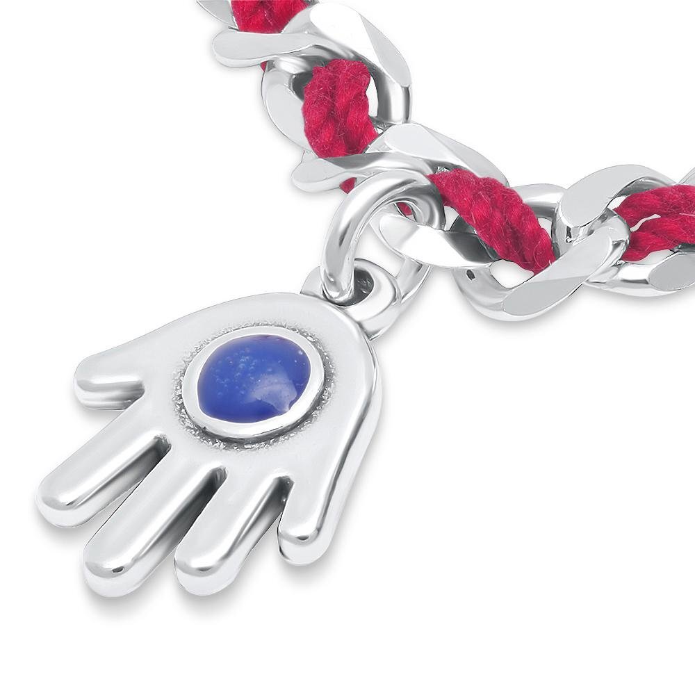 A handcrafted sterling silver hamsa charm bracelet with a red string of fate, designed for daily wear and protection.