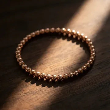 Rose gold beaded bracelet 5mm featuring high-polish spherical beads by Alef Bet
