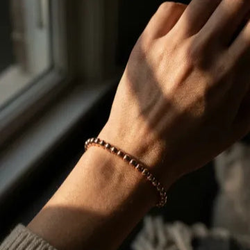 Rose gold beaded bracelet 5mm with seamless bead construction by Alef Bet