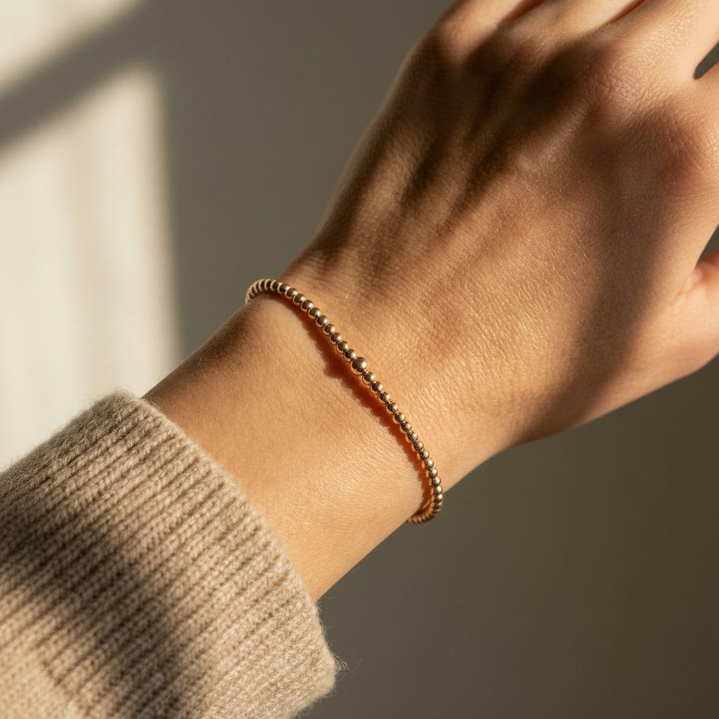 2mm rose gold bead bracelet with smooth spherical beads by Alef Bet
