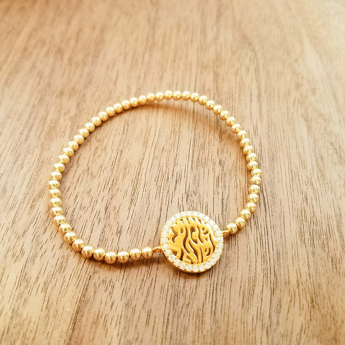Shema Israel hebrew bead bracelet in yellow gold with engraved cylindrical beads by Alef Bet