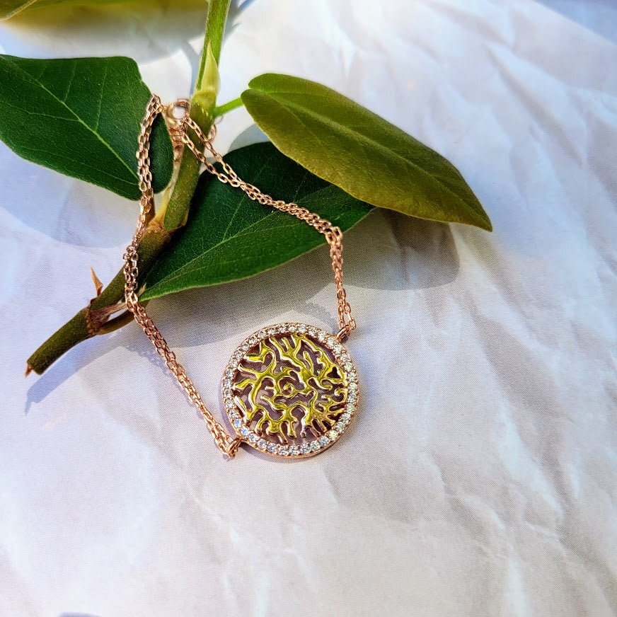 A beautiful Shema Israel Hebrew prayer bracelet for women, featuring sterling silver and cubic zirconia stones, adjustable length.