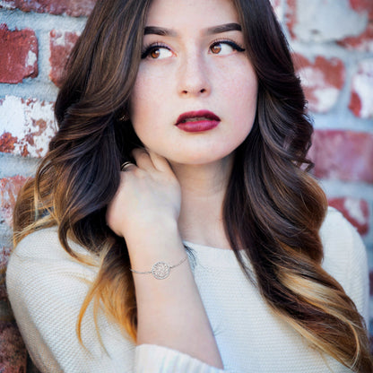 Shema Israel Hebrew prayer bracelet for women, made of sterling silver, adorned with sparkling cubic zirconia gemstones.