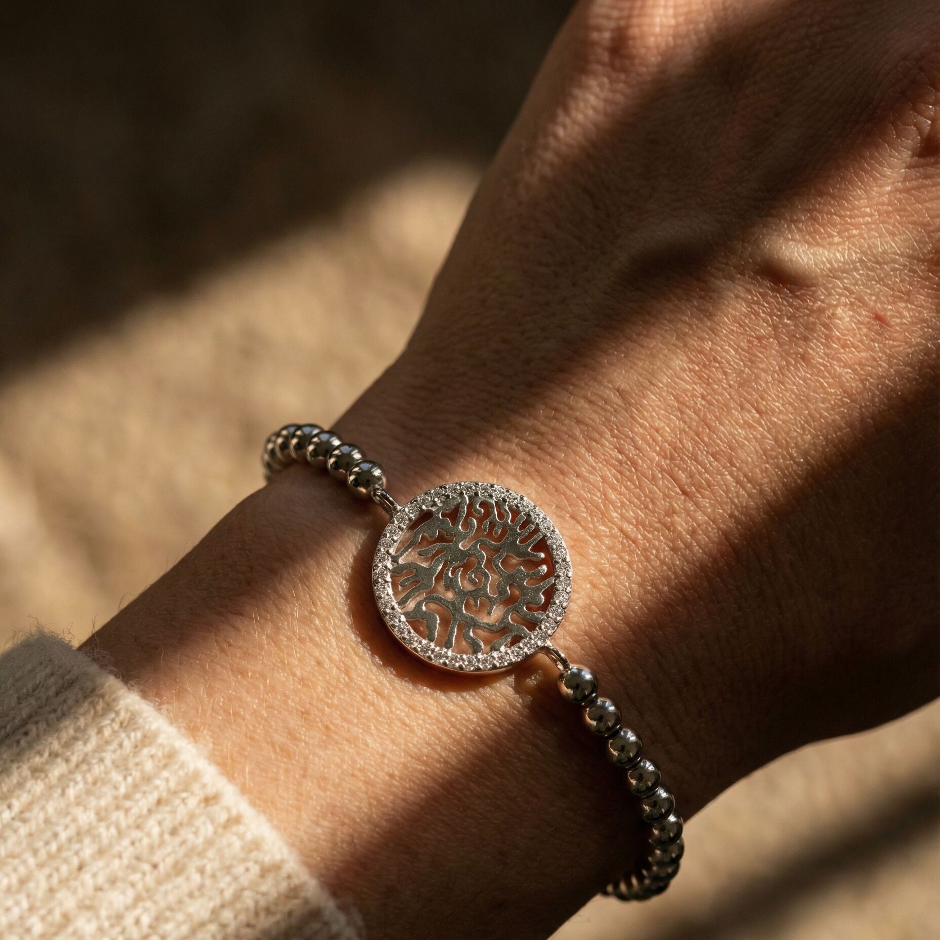 Sterling silver Shema prayer bead bracelet with polished round beads by Alef Bet, close-up detail