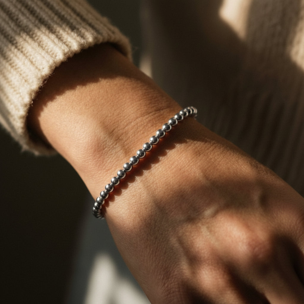 Sterling silver 4mm bead bracelet showcasing smooth polished sphere details by Alef Bet