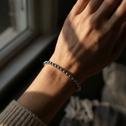 Sterling silver beaded bracelet with 5mm polished spheres shown from alternate angle by Alef Bet