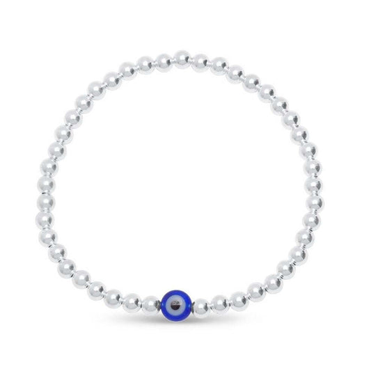 Sterling silver evil eye bracelet with blue enamel center and high-polish finish by Alef Bet