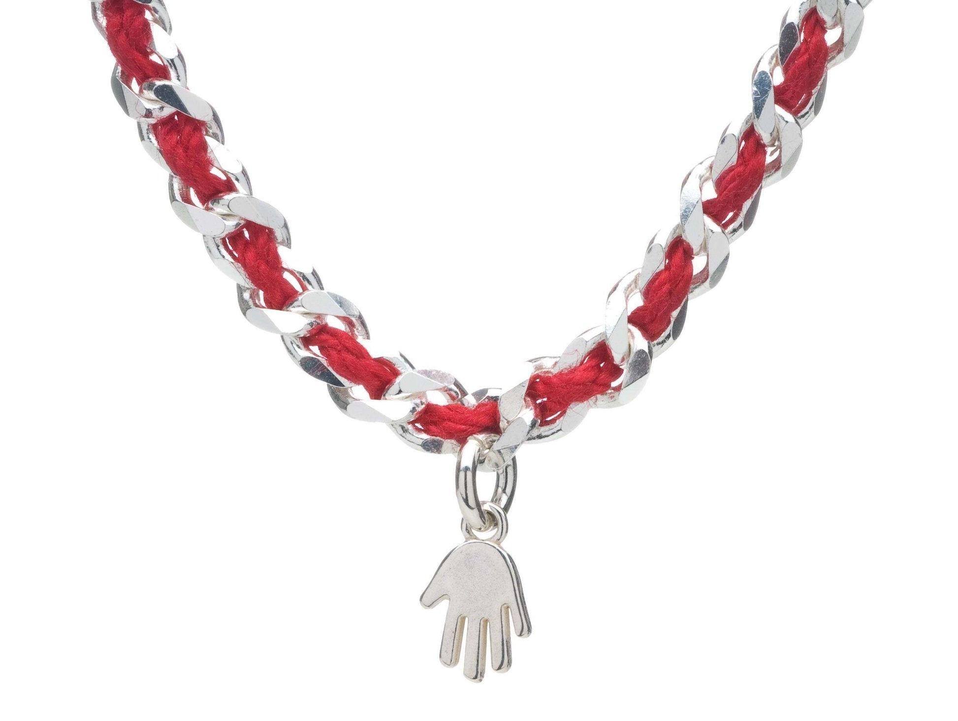 Sterling silver hamsa charm bracelet with a red string, symbolizing protection and good wishes; available in three sizes.