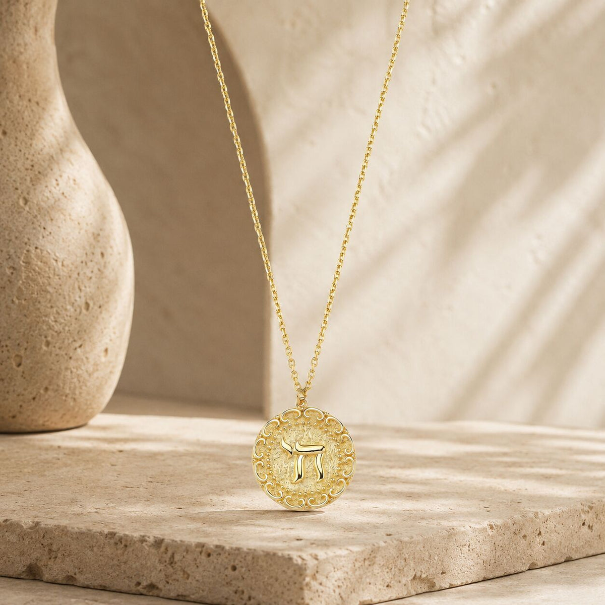 Chai Hebrew pendant in 14k gold featuring polished finish on adjustable chain by Alef Bet