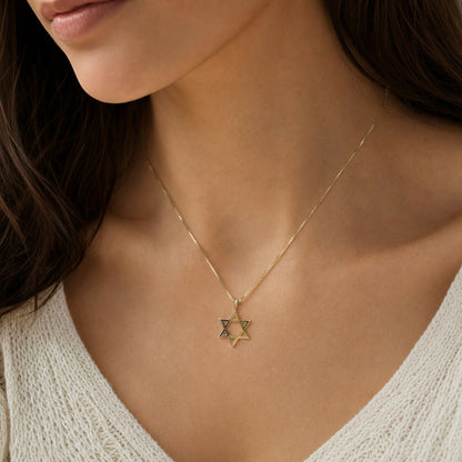 14k gold Star of David charm from alternate angle displaying dimensional design by Alef Bet