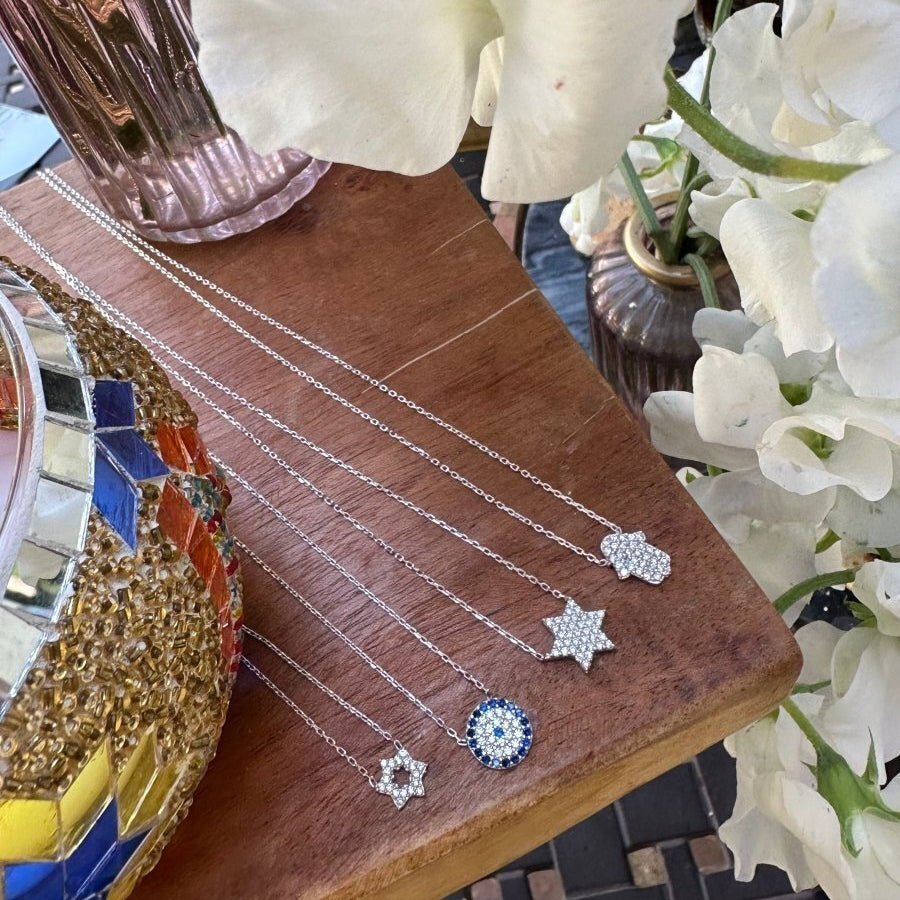 Sparkling Jewish Star Necklace in Silver with Cz Gemstones