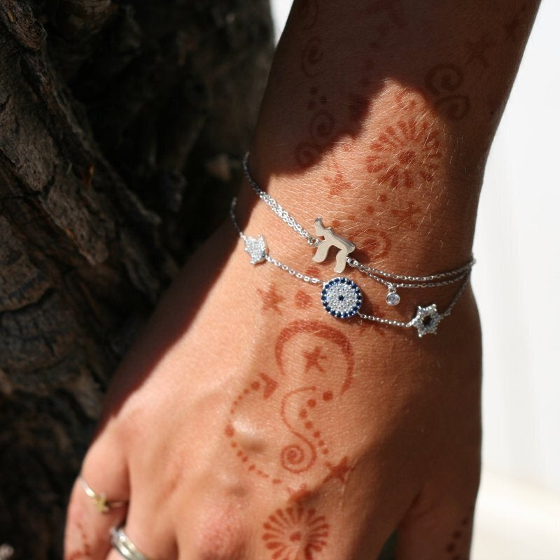 Star hamsa and evil eye bracelet in 14K yellow gold with high-polish finish by Alef Bet