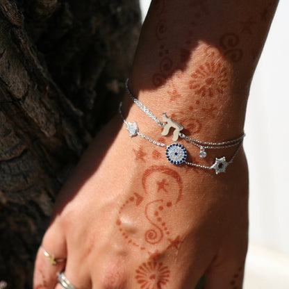 Star hamsa and evil eye bracelet in 14K yellow gold with high-polish finish by Alef Bet