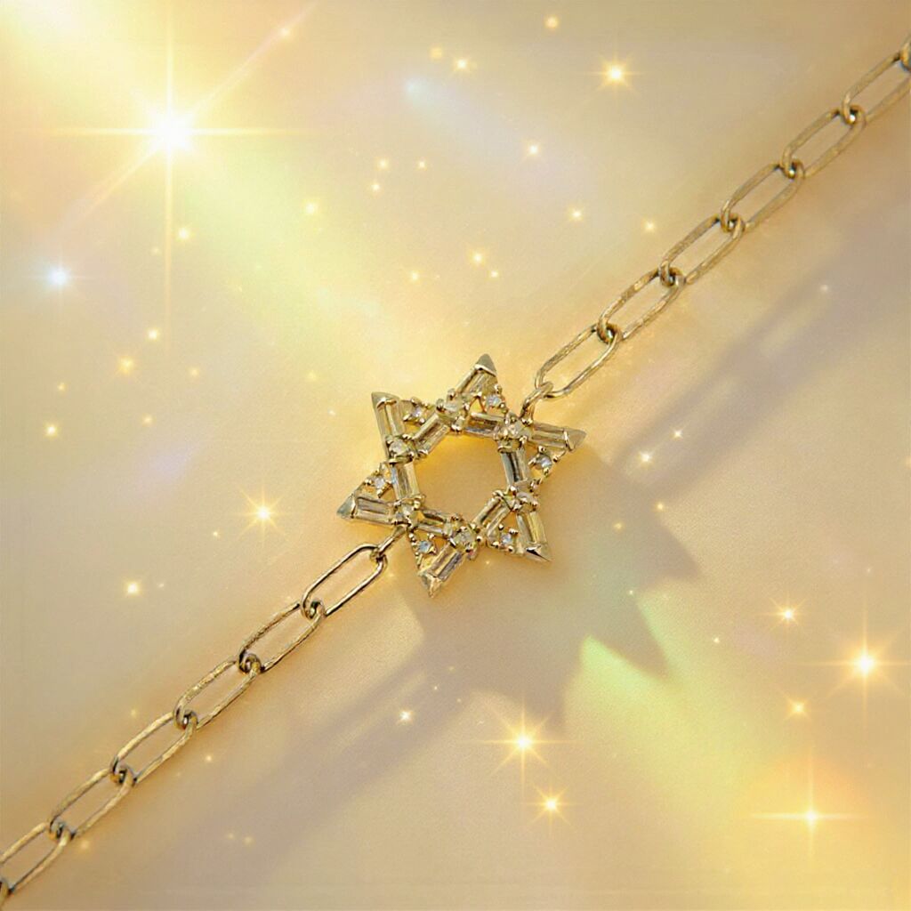 Silver or gold Star of David bracelet featuring baguette cz gemstones, adjustable from 5.75" to 7", a modern symbol of faith.