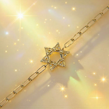 Silver or gold Star of David bracelet featuring baguette cz gemstones, adjustable from 5.75" to 7", a modern symbol of faith.