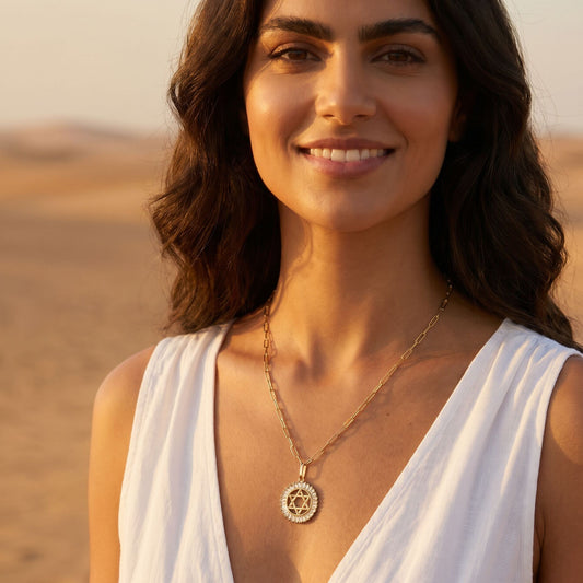 Star of David medallion on yellow gold chain with high-polish finish by Alef Bet
