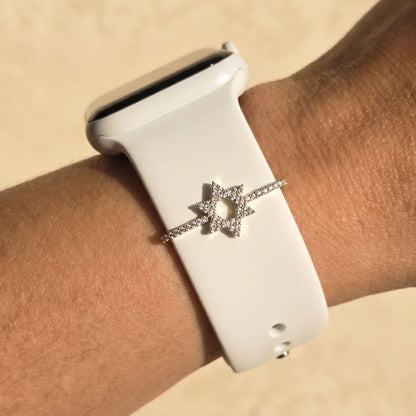 White smartwatch with a decorative pave Jewish star charm on a watch band 