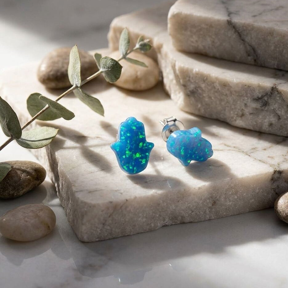 Sterling silver hamsa stud earrings with blue opal cabochon center by Alef Bet