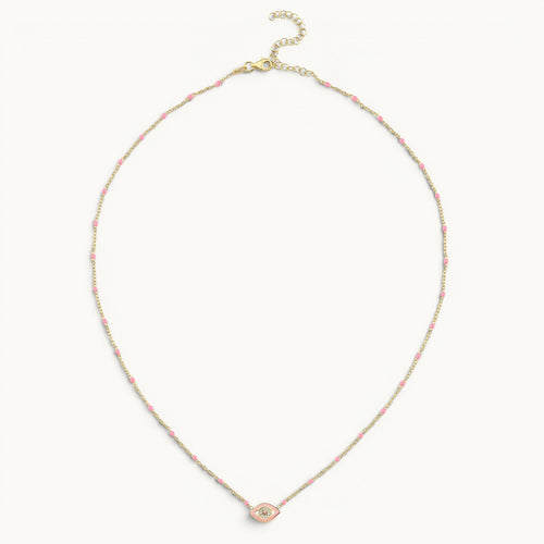Small evil eye necklace in yellow gold with pink enamel by Alef Bet